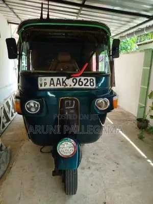Bajaj RE 2013