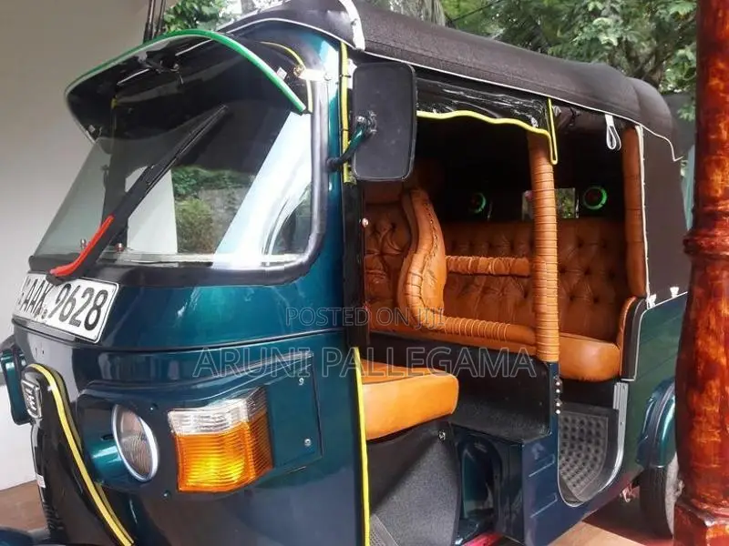 Bajaj RE 2013