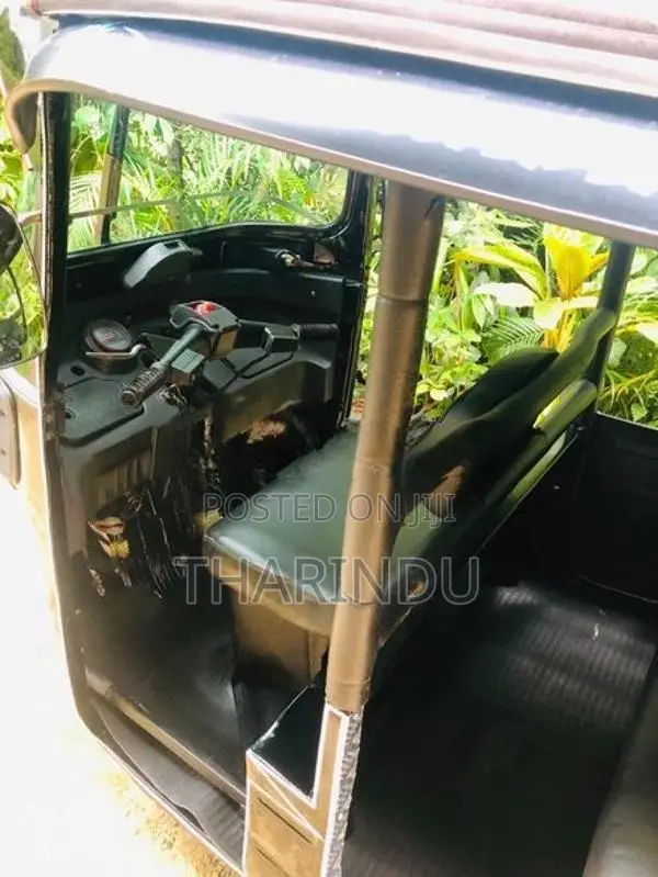 Bajaj RE 2014