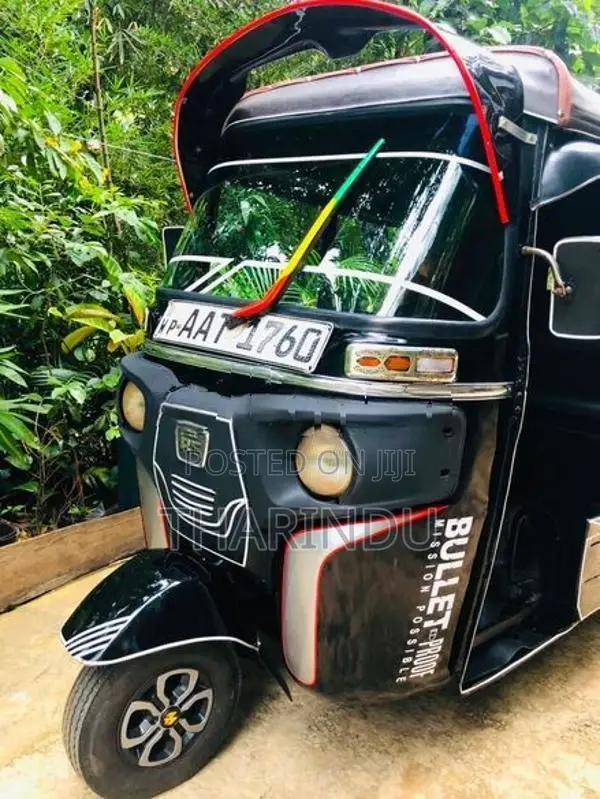 Bajaj RE 2014