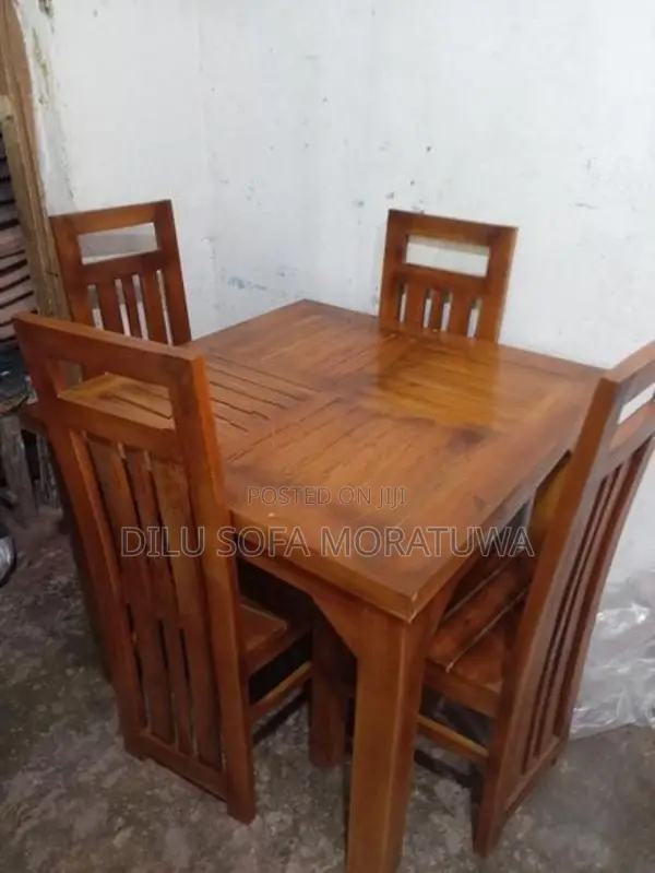 wooden dining table with 04 chairs