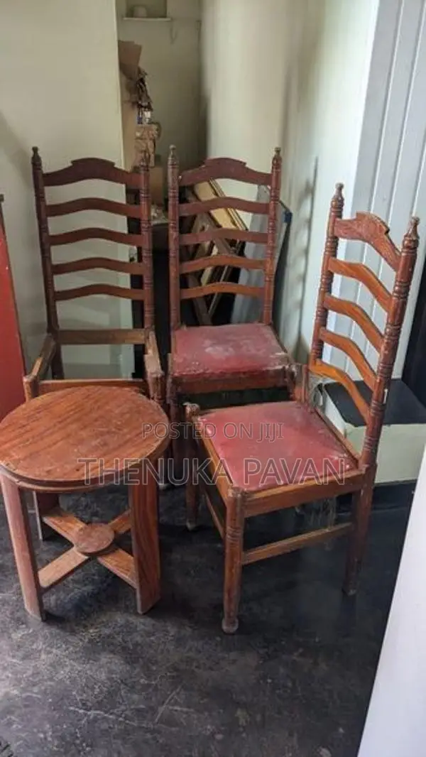 3 Wooden High-Back Chairs With Round Side Table
