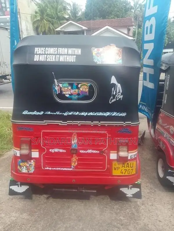 Bajaj RE 2014