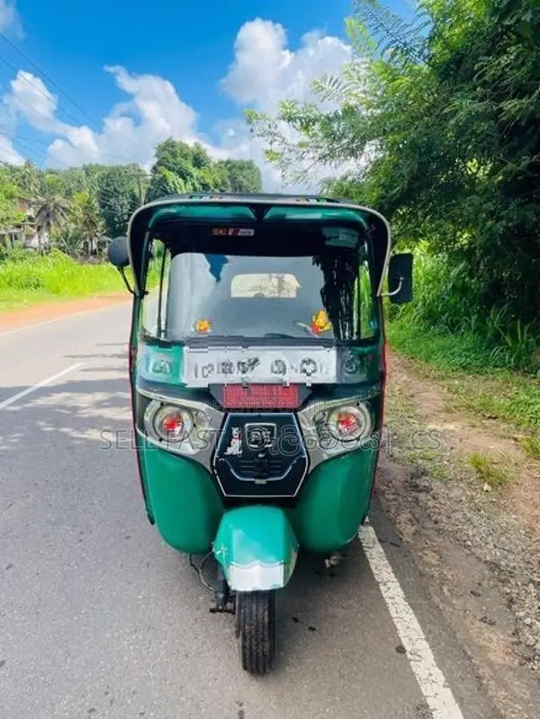 Bajaj RE 2014