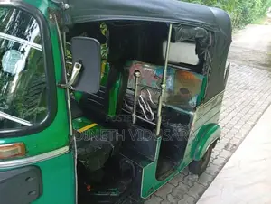 Bajaj RE 2014