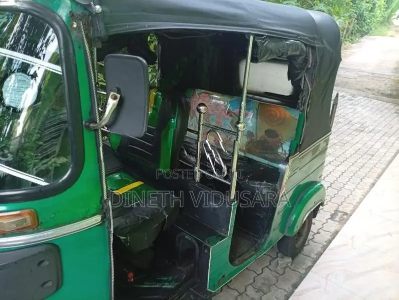Bajaj RE 2014