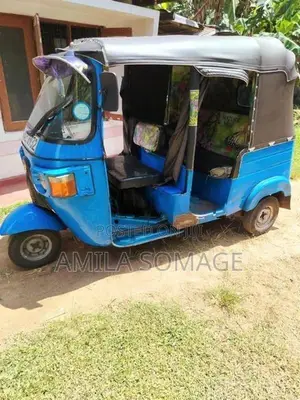 Bajaj RE 2013