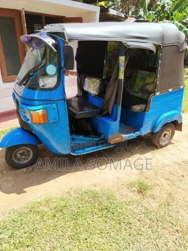 Bajaj RE 2013