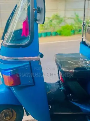 Bajaj RE 2013