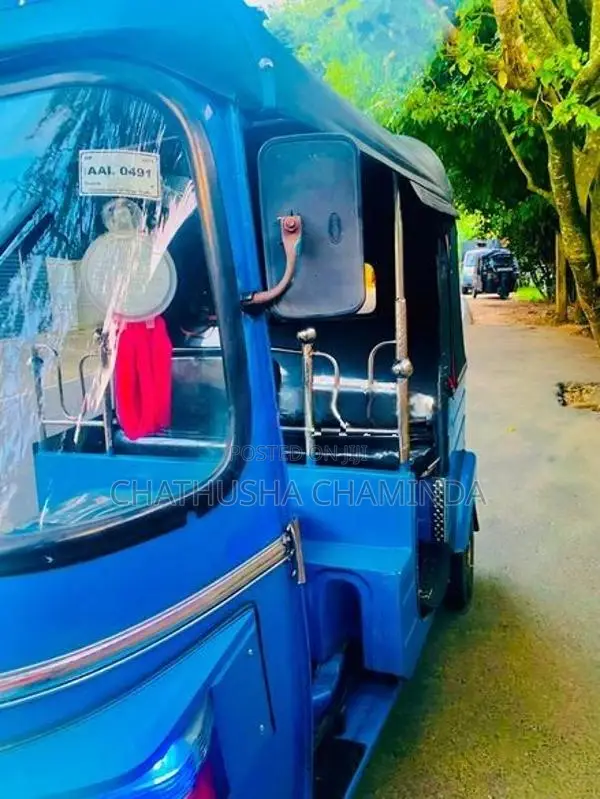 Bajaj RE 2013
