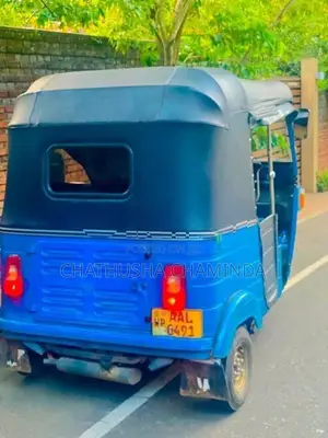 Bajaj RE 2013