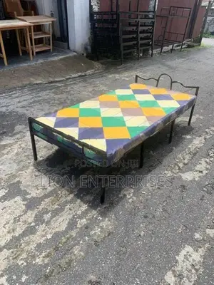 Steel single bed with mattress