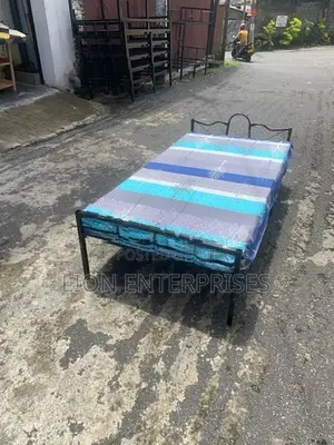 Steel single bed with mattress