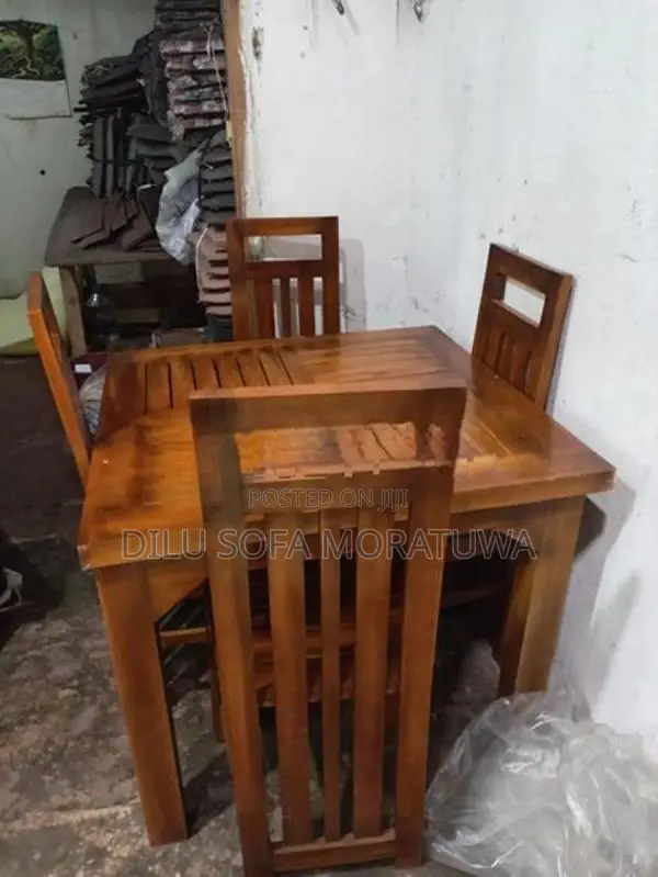 wooden dining table with 04 chairs
