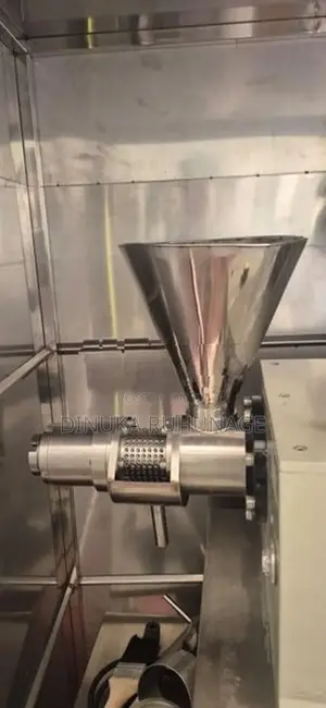 Stainless Steel පොල්තෙල් නිස්සාරණ යන්ත්‍රයක්
