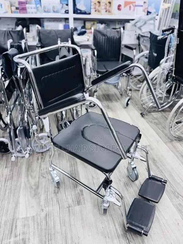 Commode Wheelchair with Caster Wheels and Declining Armrests