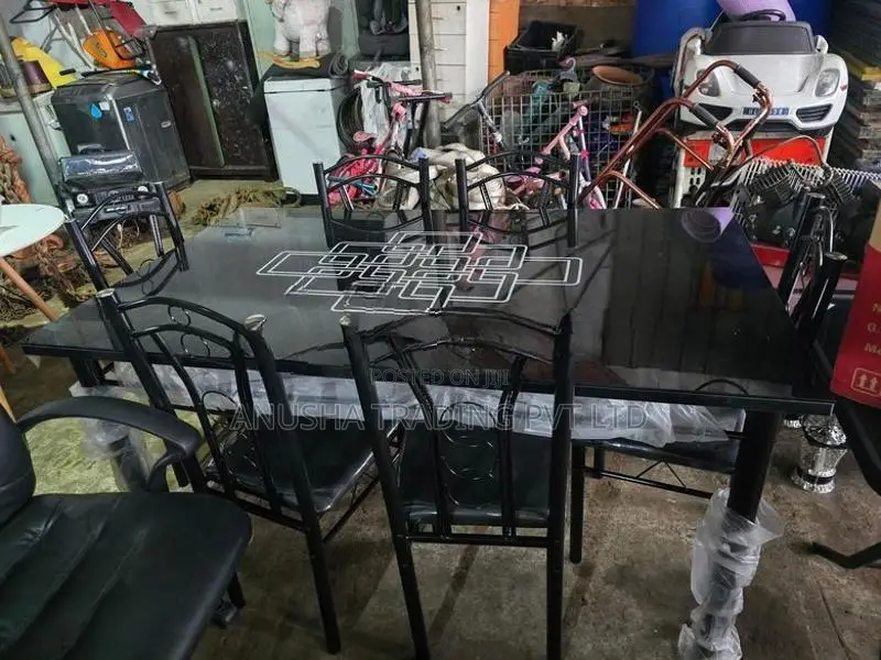 ​ Elegant 6-Seater Black Glass Dining Table