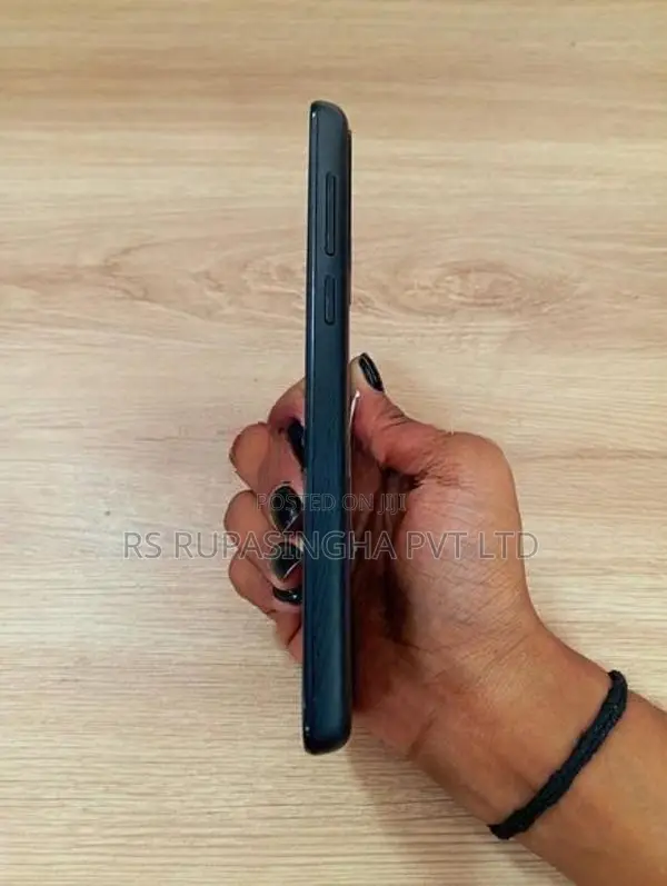 TCL 501 2/4GB 64GB (Used)