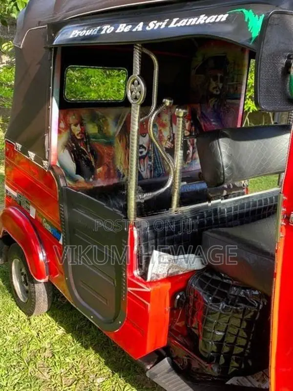 Bajaj RE 2014