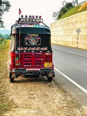 Bajaj RE 2013