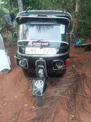 Bajaj RE 2011