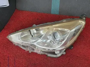 Aqua Urban Headlight – Left 52-291 Japan