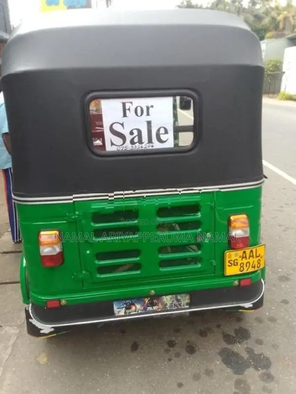 Bajaj RE 2013