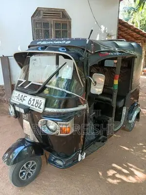 Bajaj RE 2013