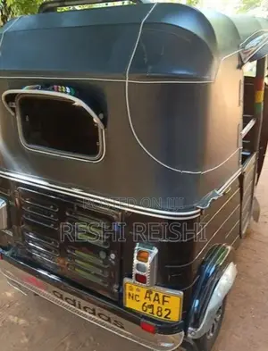 Bajaj RE 2013