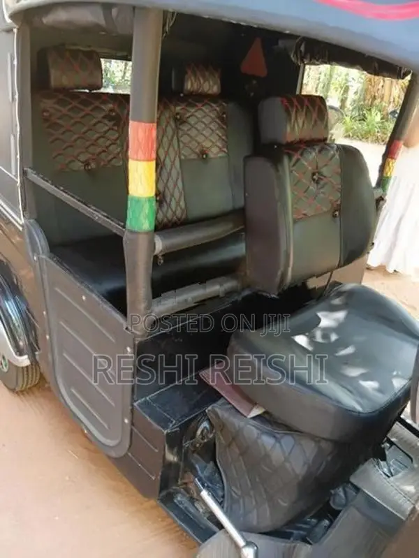 Bajaj RE 2013
