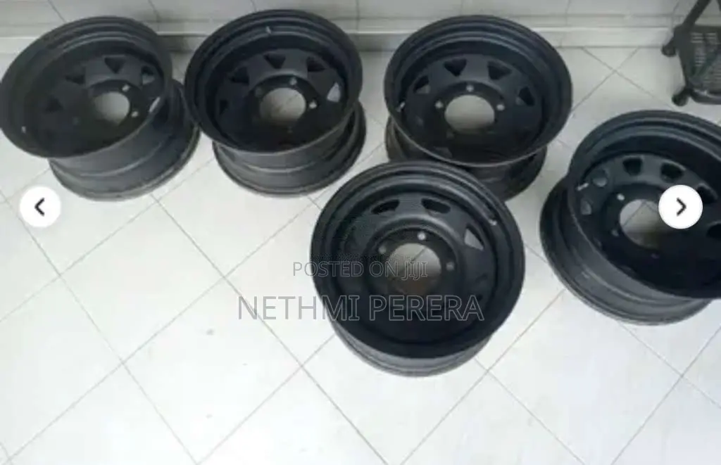 Daihatsu iron wheels and rim cups 14 for Car