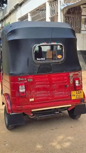 Bajaj RE 205 2013