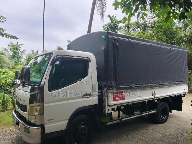Mitsubishi Canter 14.5ft Dunu 2014