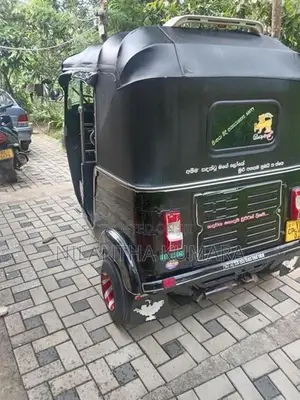 Bajaj RE 2011