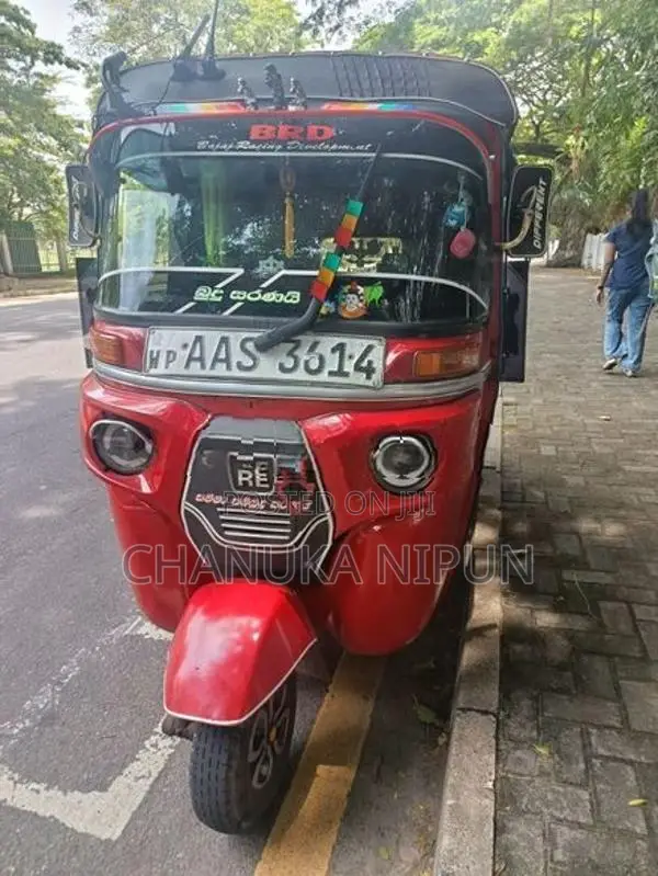 Bajaj RE 2014