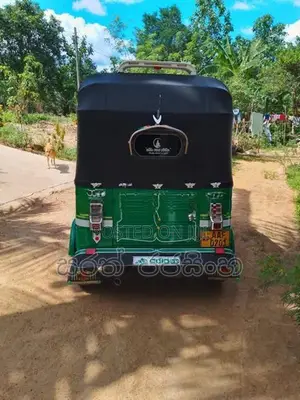 Bajaj RE 2013