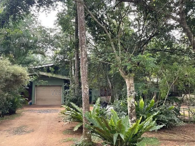 Padukka | Land with House Facing the Main Road for Sale