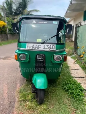 Bajaj RE 2013