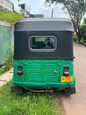 Bajaj RE 2013