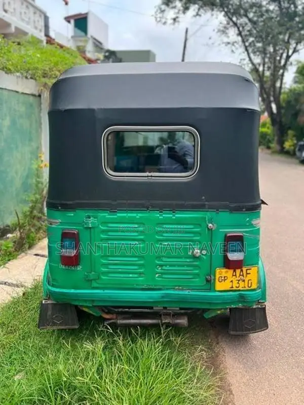 Bajaj RE 2013