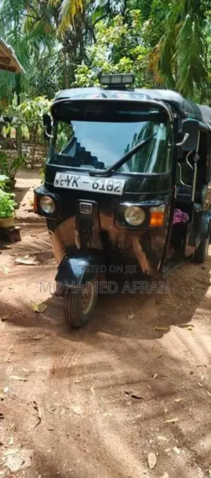 Bajaj RE 2013