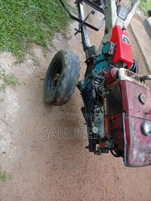 Kubota K75 1993 Tractor (Used)