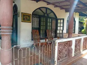 A land with house for sale