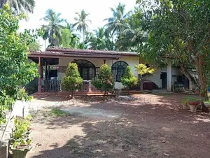 A land with house for sale