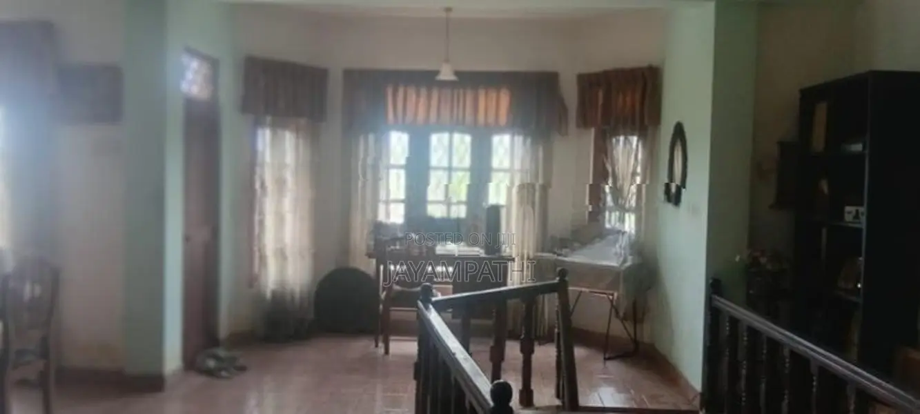 Three storie house for sale.