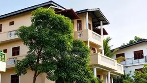 Three storie house for sale.