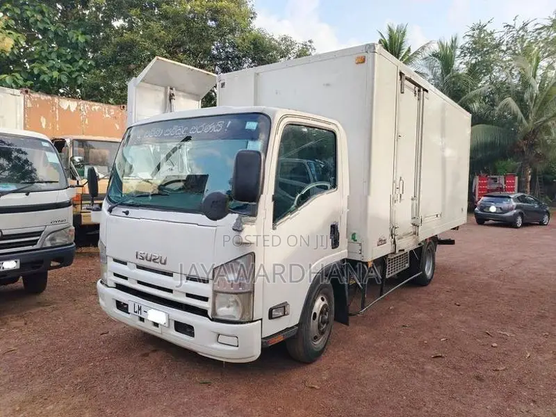Isuzu Elf NPR85 MANUAL 16FT LM 2009