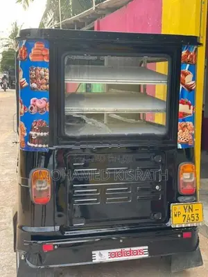 Bajaj RE 2011