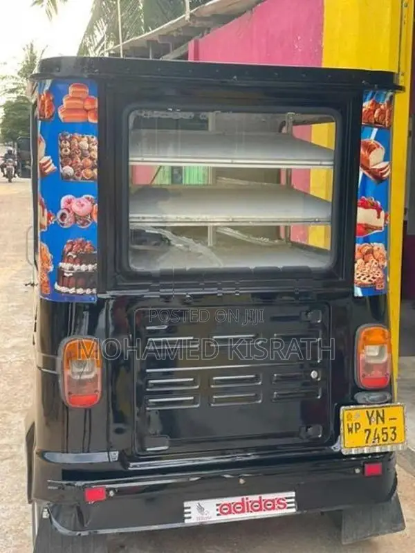 Bajaj RE 2011