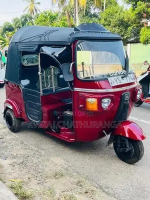 Bajaj RE 2011